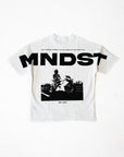 White crew neck t-shirt with large black text 'MNDST' on the front and a motorcycle graphic with text 'Fully immerse yourself in what makes you feel most alive' on the back.