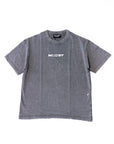 A gray oversized fit t-shirt with the brand 'MNDST' printed in white on the front.