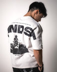 MNDST Model showcasing the back of the Immersion Tee.