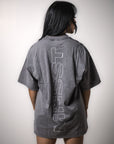 MNDST model showcasing the grey oversized Foundation tee