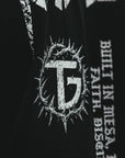 Black shirt with white TG logo and text on a black background